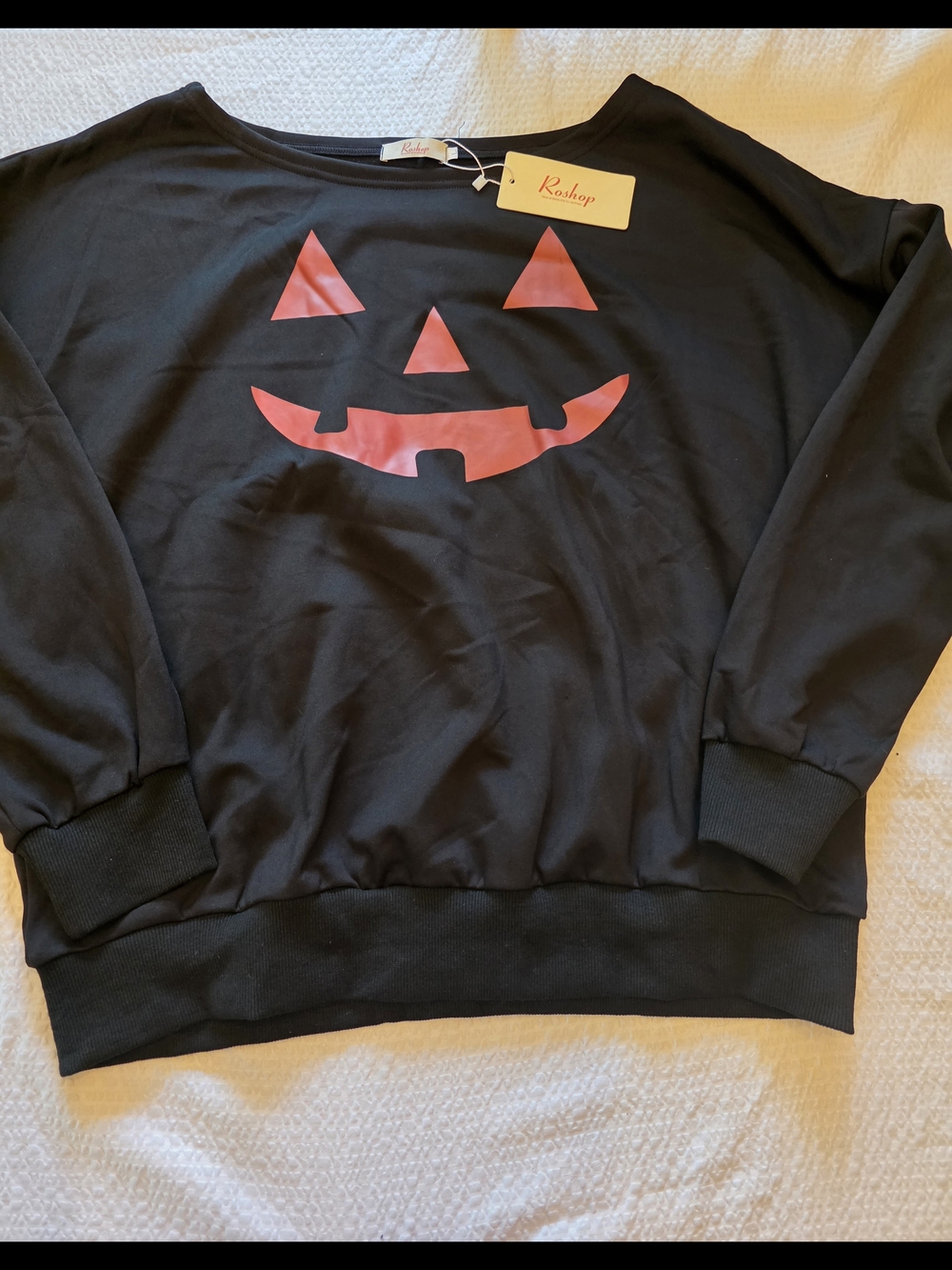 Women's Black Crewneck Sweater with Red Pumpkin Face